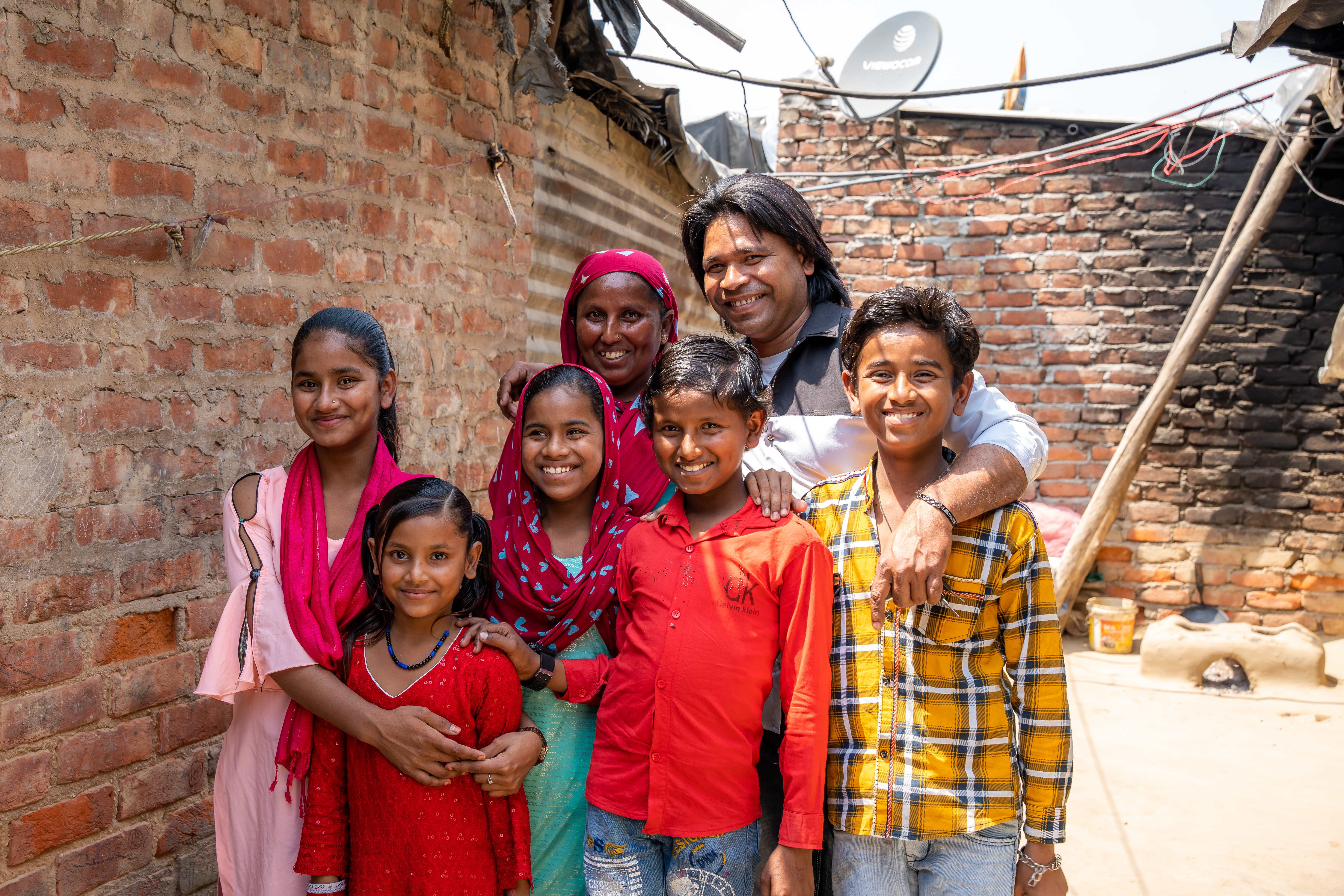 Family infront of house